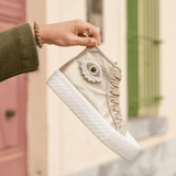 BASKETS MONTANTES DORÉES FEMME DÉTAIL OEIL PERLÉ - Casualmode.fr