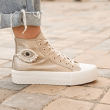 BASKETS MONTANTES DORÉES FEMME DÉTAIL OEIL PERLÉ - Casualmode.fr